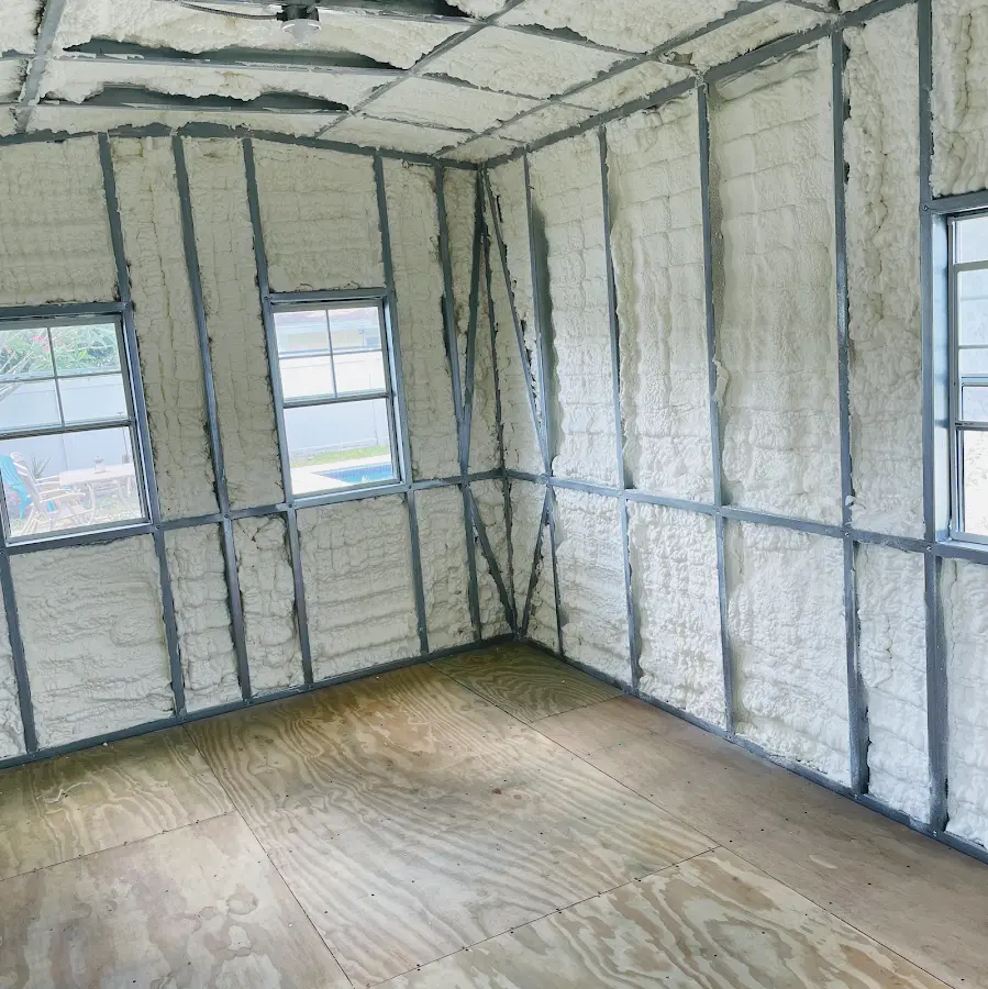 Closed-cell spray foam insulation applied to wall cavities in a residential project in Grand Terrace